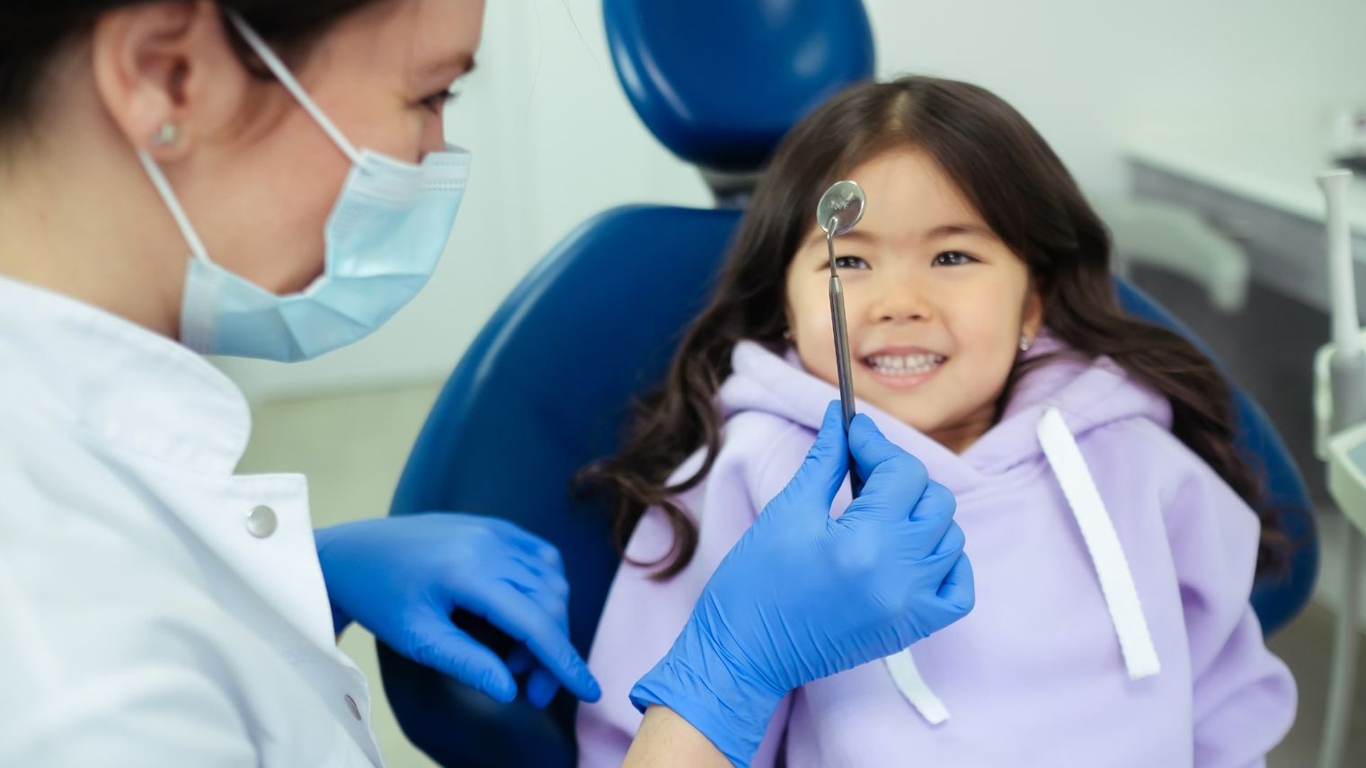 Dentist examining a patient